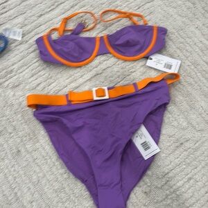 We wore what bikini size small top and medium bottom selling as set new w/ tags